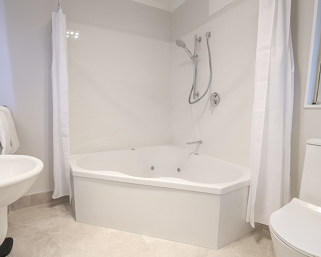 Bathroom with corner tub